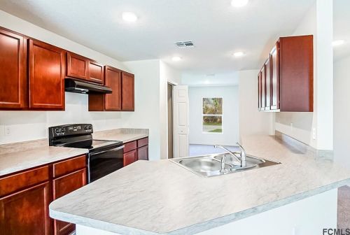 157 Belleaire Dr, Palm Coast FL  32137-8618 exterior