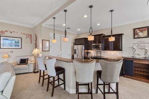 9407 Quarry Dr, Naples FL  34120-5223 exterior
