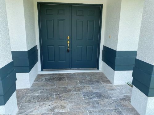 673 Woodcrest Dr, Lehigh Acres, FL 33972-1034