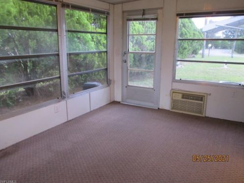 1 Hamlin Ct, Lehigh Acres FL 33936-7211 exterior