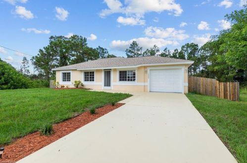 1206 Jaguar Blvd, Lehigh Acres, FL 33974-9427