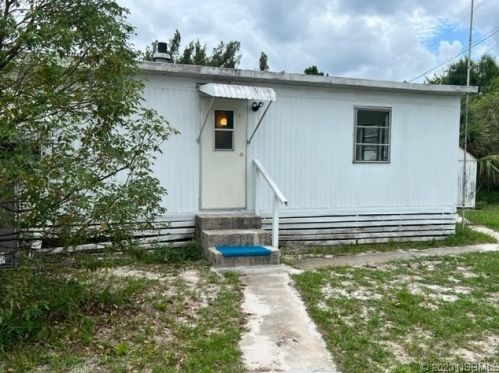 112 West Loop, Oak Hill, FL 32759-9722