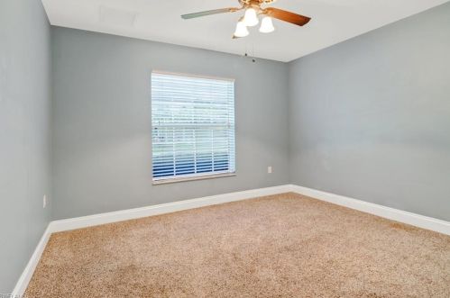 1118 Alaska Ave, Lehigh Acres FL 33971-6460 exterior