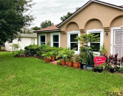 5 Buffalo Bill Dr, Palm Coast, FL 32137-9468