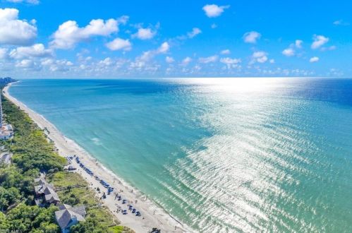 571 Beachwalk Cir, Naples FL  34108-8742 exterior