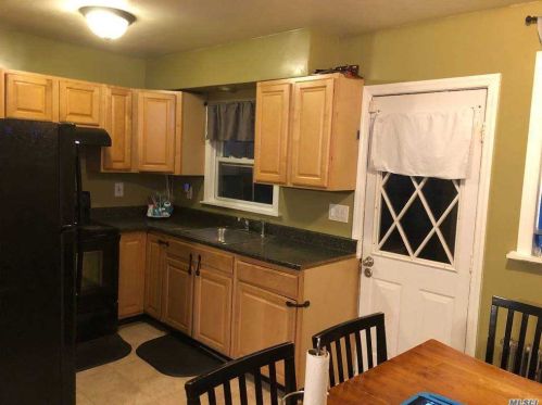 93 Henry St, Roosevelt, NY 11575-1304