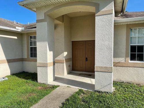 768 Longbow Ln, Lehigh Acres, FL 33972-1016
