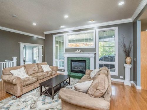 609 6th St, Mitchellville, IA 50169-8464