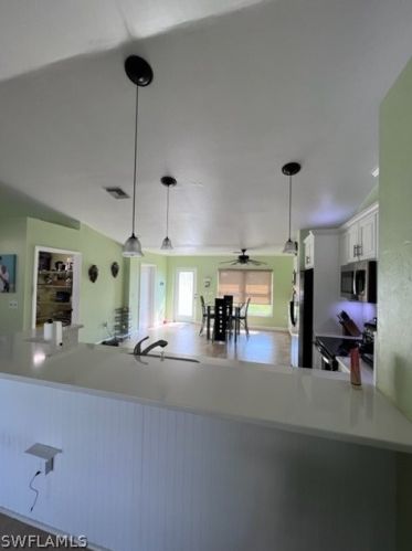 1041 Cedartree Ave, Lehigh Acres FL 33971-7590 exterior