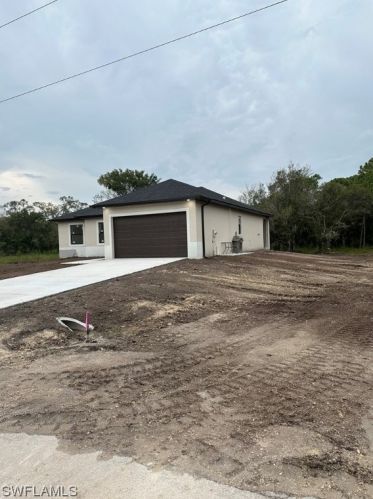 1215 Mcarthur Ave, Lehigh Acres, FL 33972-2509