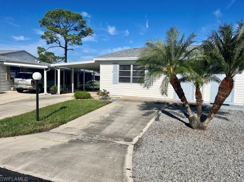 18 Pinewood Blvd, Lehigh Acres, FL 33936-7304