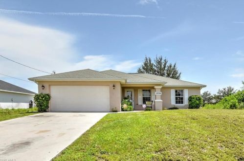 1034 Champion Ave, Lehigh Acres, FL 33971-6579