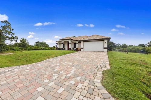1210 Plumosa Ave, Lehigh Acres, FL 33972-8419