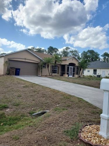 301 Robert Ave, Lehigh Acres, FL 33936-1623