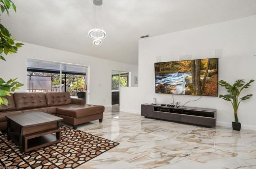 101 Sharwood Dr, Naples FL  34110-5721 exterior