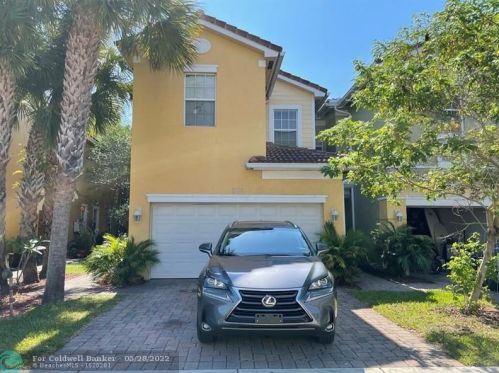 869 Pipers Cay Dr, West Palm Beach, FL 33415-4010