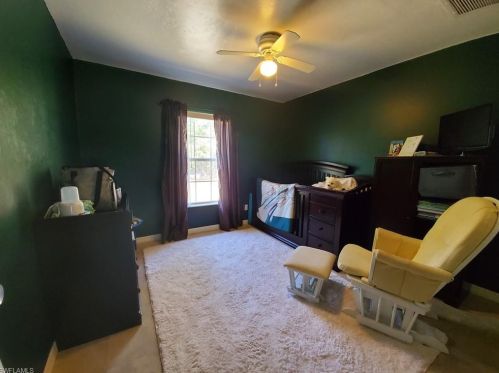 921 Wellington Ave, Lehigh Acres FL 33972-1318 exterior