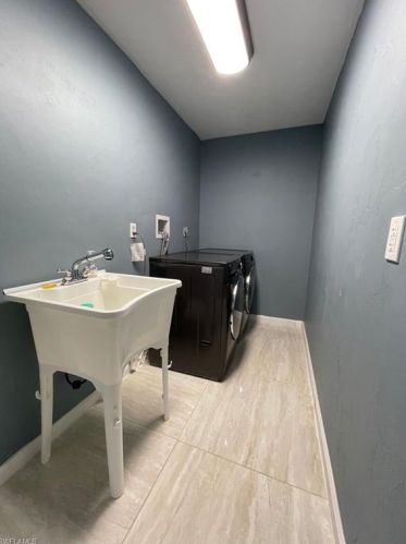 218 Roosevelt Ave, Lehigh Acres FL 33972-1200 exterior