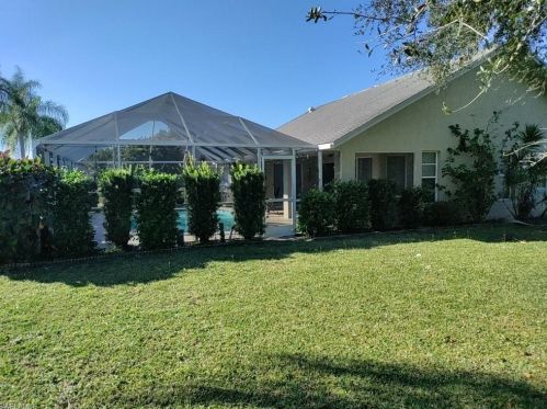 694 Covey Ln, Lehigh Acres, FL 33974-5971