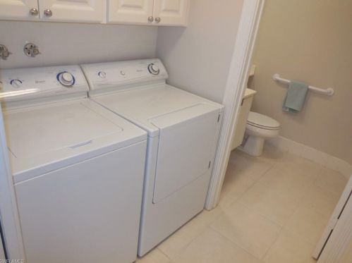 6048 Towncenter Cir, Naples FL  34119-9556 exterior