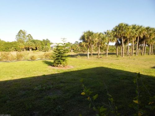 213 Shadow Lakes Dr, Lehigh Acres FL  33974-0806 exterior