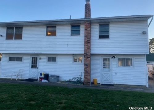 59 34th St, Copiague, NY 11726-2512