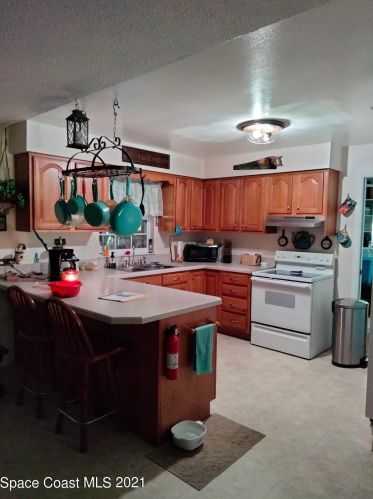 1705 Lilac Cir, Titusville, FL 32796-3239