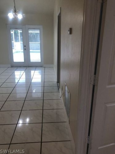 706 Arianne Ct, Lehigh Acres, FL 33936-6900