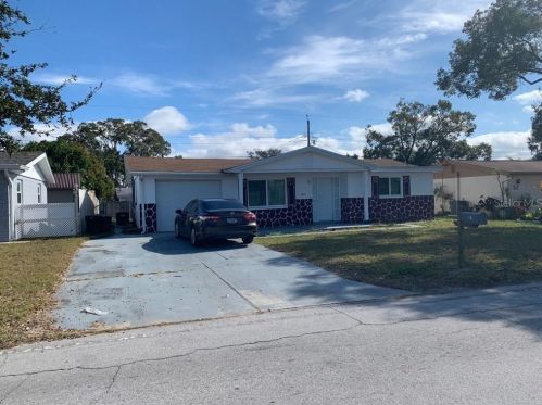2426 Arcadia Rd, Tarpon Springs, FL 34690-4004