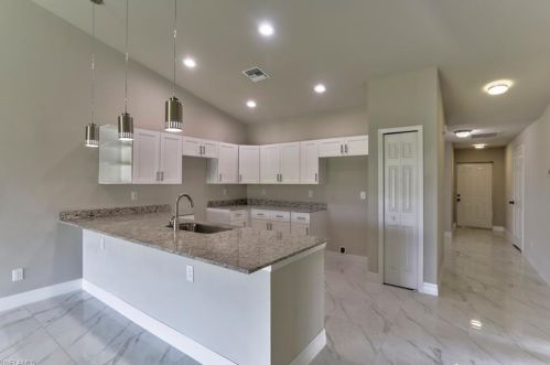 321 Ivan Ave, Lehigh Acres, FL 33973-2011