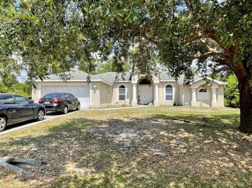 1112 Grant Blvd, Lehigh Acres, FL 33974-4801