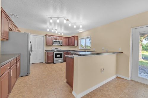 704 Toulon Dr, Kissimmee FL  34759-7020 exterior