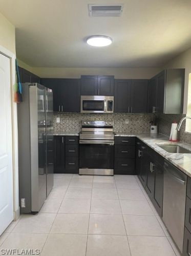 206 Floyd Ave, Lehigh Acres FL 33971-1716 exterior