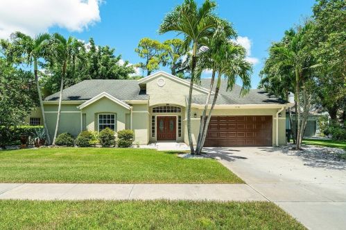 1112 Wild Cherry Ln, West Palm Beach FL  33414-7904 exterior