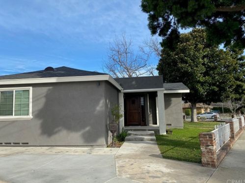 9821 Tweedy Ln, Downey, CA 90240-3823