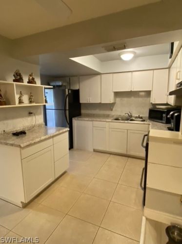 310 Vermont Way, Lehigh Acres, FL 33936-5028