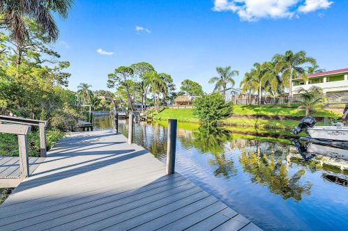 1447 Peninsula Ln, Palm City, FL 34990-1938