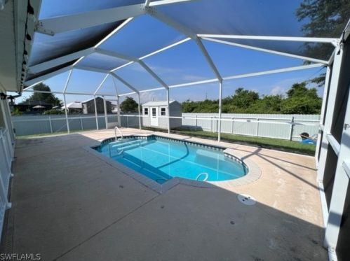 1041 Cedartree Ave, Lehigh Acres FL 33971-7590 exterior