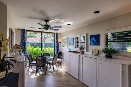 586 Beachwalk Cir, Naples FL  34108-7734 exterior