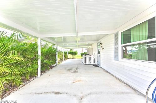 18 Dawn Flower Cir, Lehigh Acres FL 33936-7355 exterior