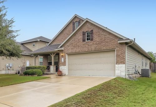 321 Bottle Brush Dr, Uhland, TX 78640-5951