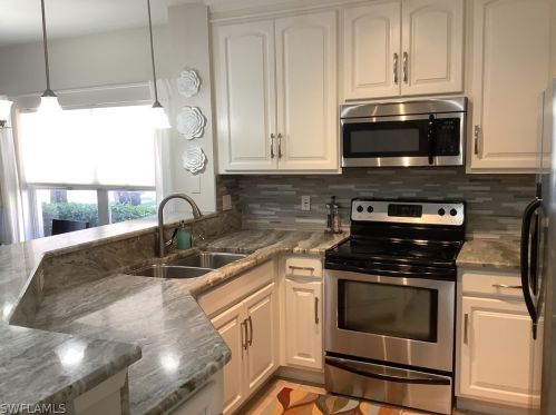 8632 Athena Ct, Lehigh Acres, FL 33971-3754