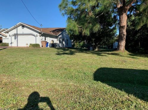 414 Palmetto Ave, Lehigh Acres FL 33972-7859 exterior