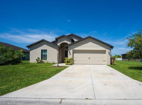 154 Shadow Lakes Dr, Lehigh Acres FL  33974-0803 exterior