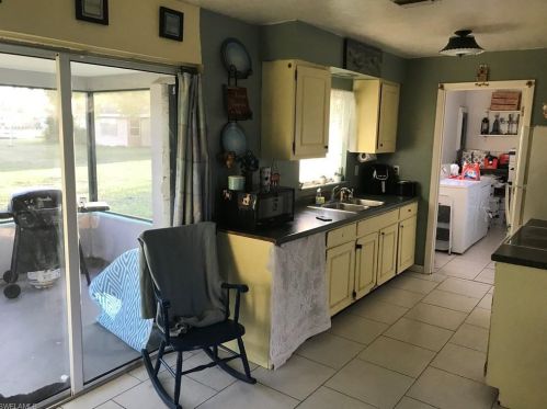 506 Coolidge Ave, Lehigh Acres FL 33936-6102 exterior