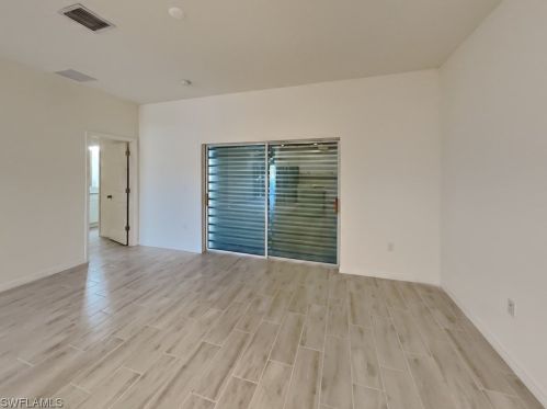 704 Hightower Ave, Lehigh Acres, FL 33973-2693