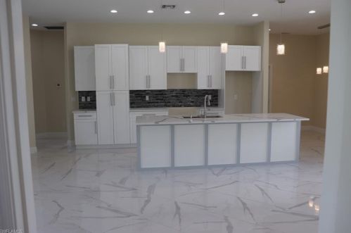 827 Sunrise Blvd, Lehigh Acres FL 33974-9795 exterior