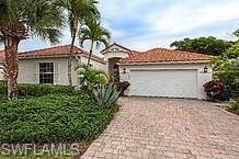 1522 Whispering Oaks Cir, Naples, FL 34110-4139