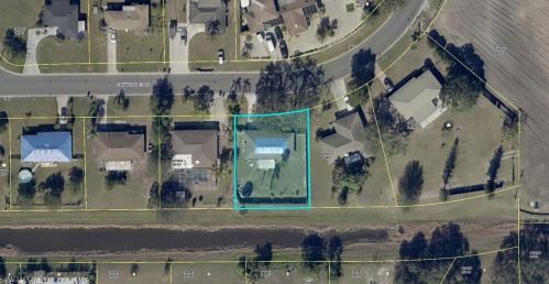 1422 Caywood Cir, Lehigh Acres FL  33936-5960 exterior