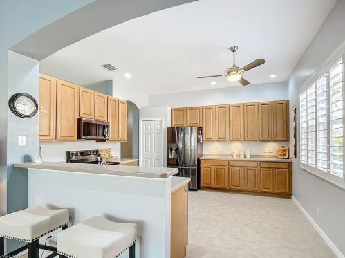 5690 Lago Villaggio Way, Naples FL  34104-5739 exterior